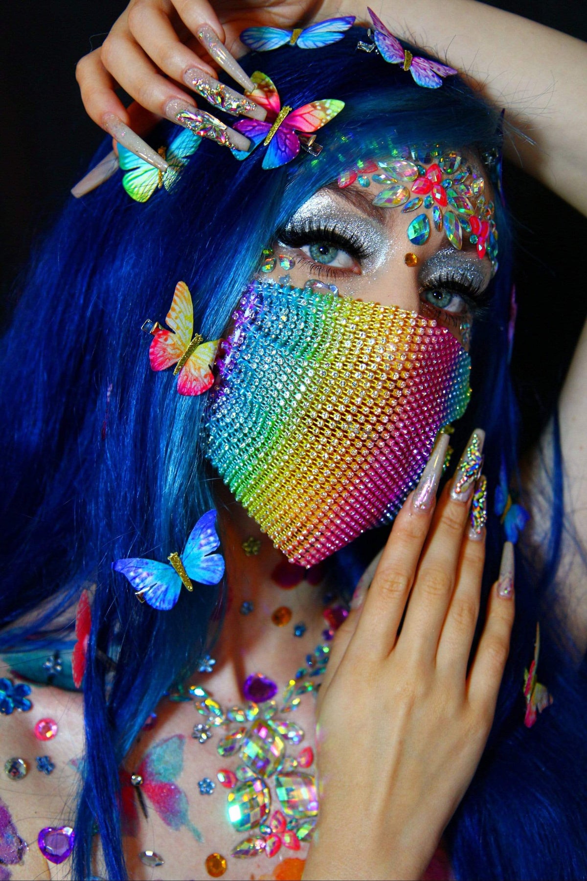Front view of pink and blue crystal tiara face jewels with the full design visible