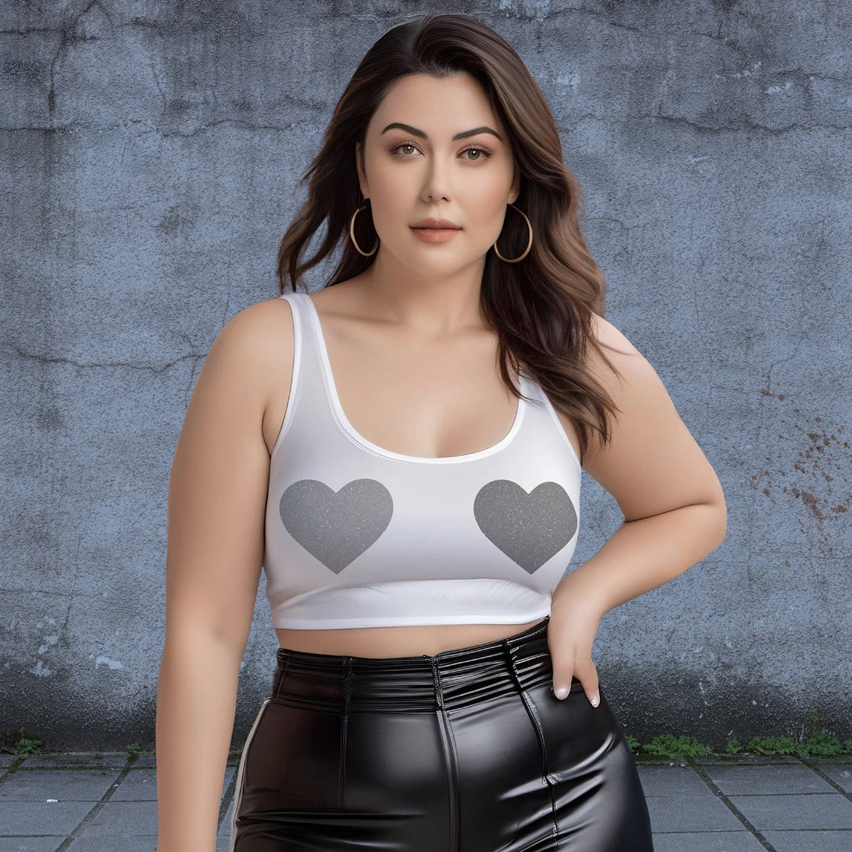 Model wearing black glitter plus size heart nipple pasties for dark glam coverage