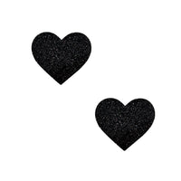 Sparkling glitter finish on black glitter heart body stickers, full view of the design