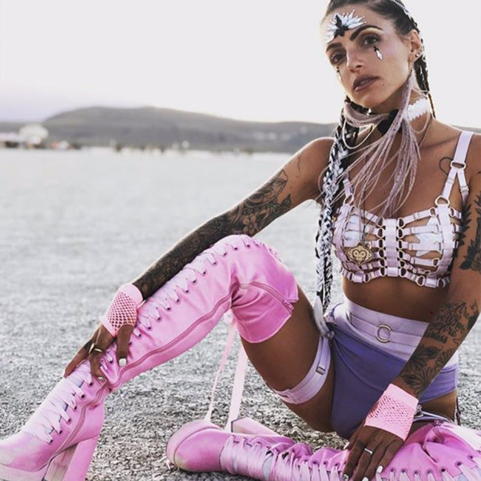 Iridescent and black crystal tiara face jewels for a bold warrior makeup look