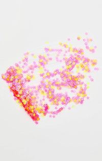 Assorted cosmetic glitter keychains in aloe gel in a rainbow of colors