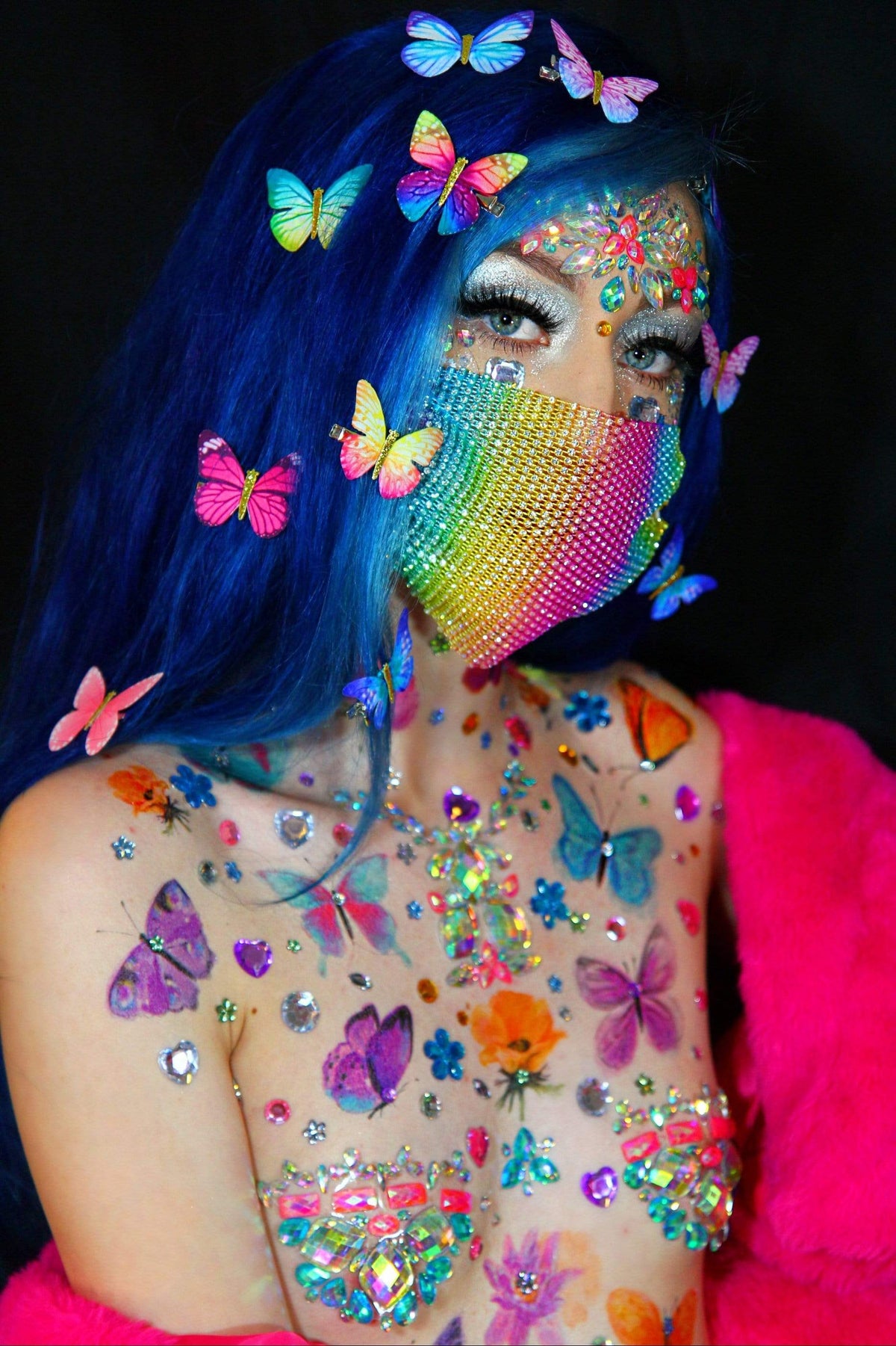 Alternate view of the rainbow butterfly pride bundle with pasties and tattoos