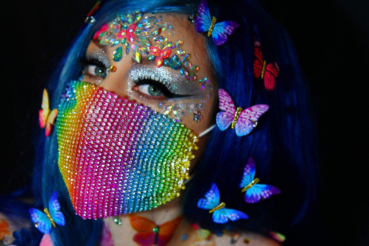 Rainbow butterfly pasties, tattoos and jewels bundle laid out for pride