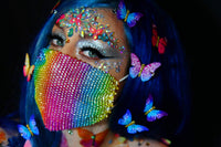 Rainbow butterfly pasties, tattoos and jewels bundle laid out for pride