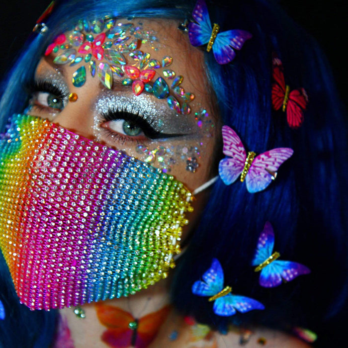 Rainbow butterfly pasties, tattoos and jewels bundle laid out for pride