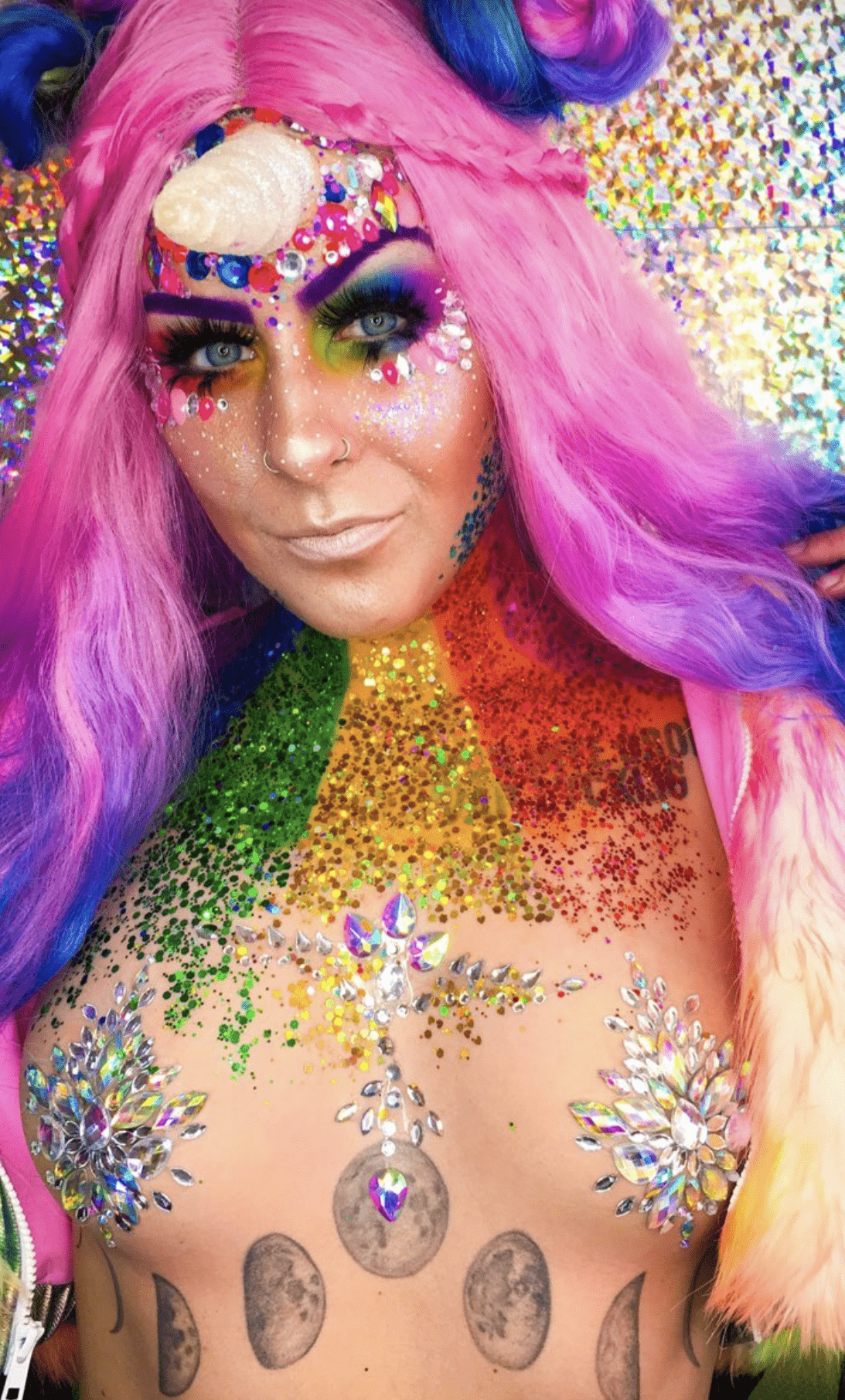 Iridescent crystal star body sticker with rainbow sparkle for a fairy festival look