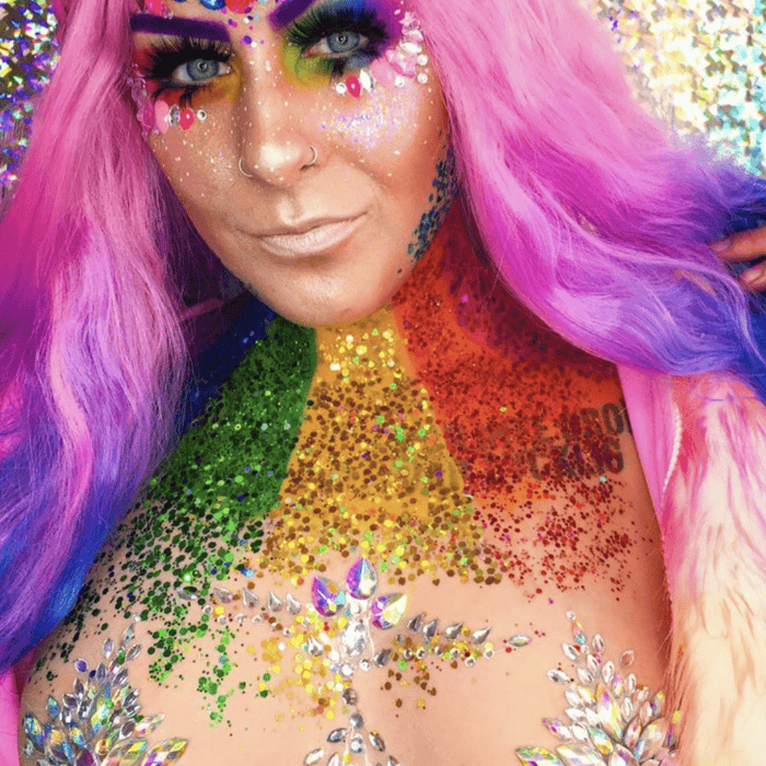 Iridescent crystal star body sticker with rainbow sparkle for a fairy festival look
