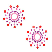 Orange and pink crystal jewel nipple pasties shown alone, with lilac and orange crystal accents