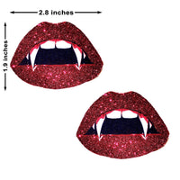 Sparkly red glitter lips with pointed vampire fangs made as Halloween nipple covers