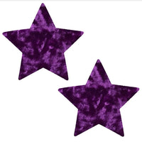 Dark purple velvet star nipple pasties, showing the color, finish and shape of the design