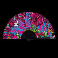 Multicolor playing card print folding fan in hot pink and yellow for a wonderland rave