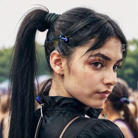 Soft stretchy black hair ties that hold ponytails without snagging or creasing hair