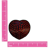 Front view of red crystal on black heart reusable silicone pasties with the full design visible