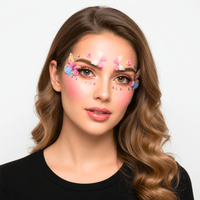 Pink and purple crystal butterfly stickers for a playful fairy face look