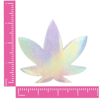 Pair of silver holographic cannabis leaf nipple covers that flash rainbow colors, shown alone