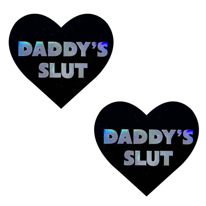 Black holographic heart nipple pasties with naughty lettering for kink nights