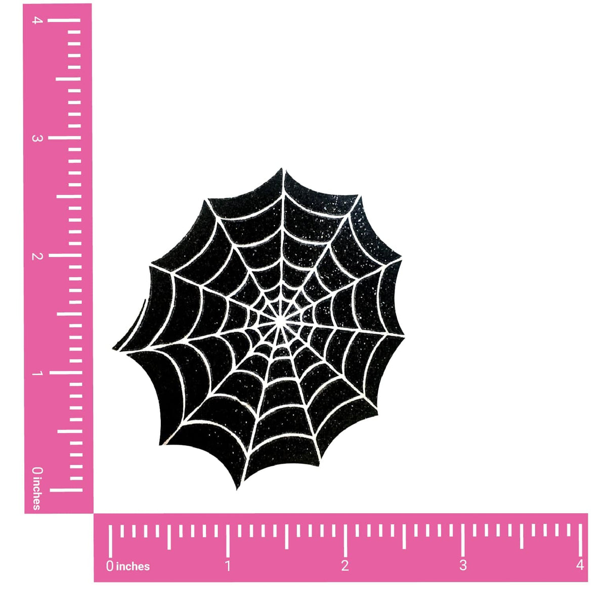 Glitter spider web nipple pasties that glow under blacklight, shown on their own
