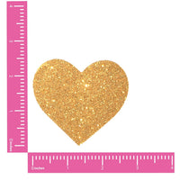 Gold Glitter Heart Nipple Pasties shown on their own with a sparkling glitter finish