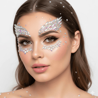 Iridescent clear crystal face jewels in a winged design with rainbow shimmer