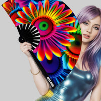 Large rave folding fan with glowing neon daisies for dancing and keeping cool all day