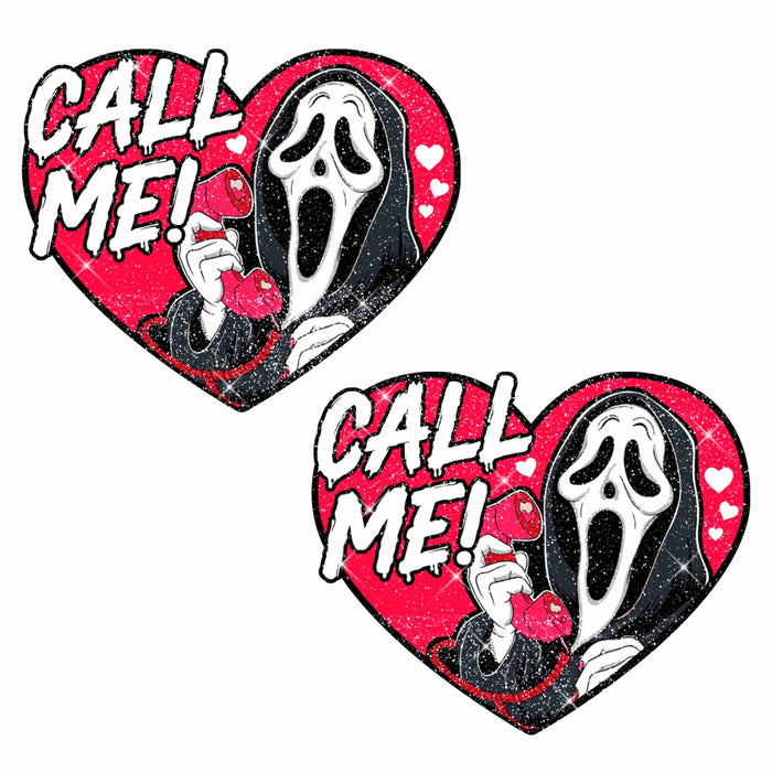 Red glitter heart nipple pasties with a slasher phone call design for Halloween