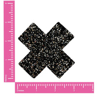 Black and silver chunky glitter X shaped nipple pasties, shown on their own
