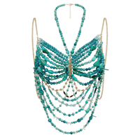 Turquoise beaded backless carnival top with shimmering bead strands