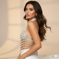 White pearl crop top with backless ties for a sparkling rave party outfit