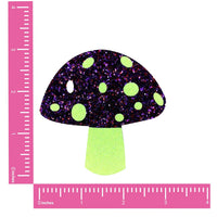 Yellow and purple glitter mushroom nipple pasties that glow under blacklight, shown alone