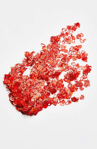 Cosmetic glitter keychains in aloe gel shown up close to highlight the finish
