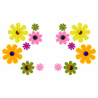 Neon glitter daisy face sticker with jewels seen from an alternate angle