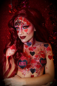 Product shot of red glitter and crystal Valentine makeup bundle highlighting color and texture