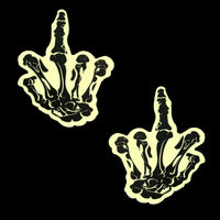 Front view of white glow in the dark skeleton hand nipple pasties with the full design visible