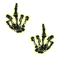 White glow in the dark skeleton hand nipple pasties shown on a clean background