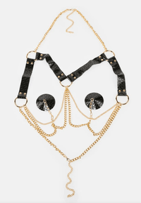 Product view of the black gold chain harness silicone nipple pasties highlighting shape and color