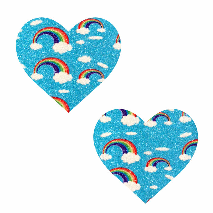 Blue glitter rainbow and cloud heart nipple pasties shown on a clean background