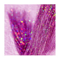 Pink sparkle tinsel clip in hair extensions in full view with its signature color and shape