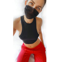 Model wearing the black iridescent crystal mesh jewel face mask for a goth rave night