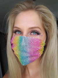 Model wearing the rainbow striped crystal mesh jewel face mask for a pride party