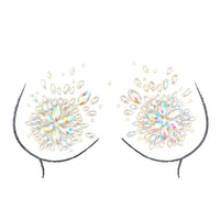 Product shot of icy crystal pasties and lunar face sticker bundle highlighting color and texture