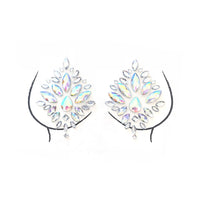 Close view of iridescent rhinestone diamond nipple covers glittering in pink and blue tones