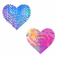 Standalone product shot of the rainbow holographic dino heart nipple pasties