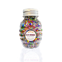 Rainbow holographic cosmetic glitter in aloe gel on a keychain shown on a clean background