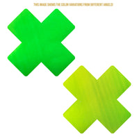 Green yellow color changing X nipple pasties, showing the color, finish and shape of the design