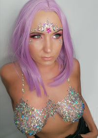 Front view of icy crystal pasties and lunar face sticker bundle with the full design visible