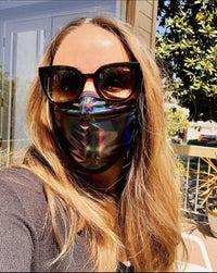 Front view of gunmetal gray holographic face mask with the full design visible