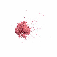 Pale pink shimmer loose pigment eyeshadow with a soft pearly shimmer