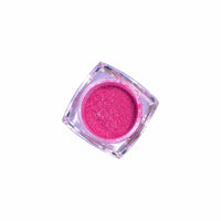 Product shot of rhubarb pink shimmer loose pigment eyeshadow in a dessert inspired shade