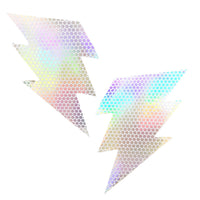 Pair of white holographic lightning bolt nipple pasties, shown on their own