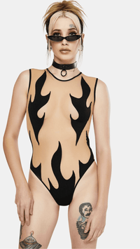 Model in the black flame nude mesh bodysuit, front view showing the sheer mesh